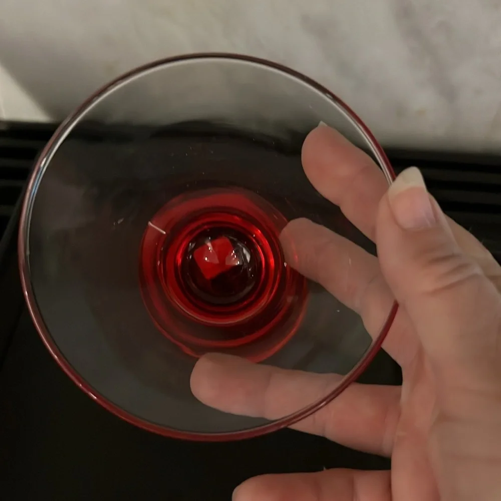 Crate & Barrel Dizzy Red Liquor Cocktail Weighted Glass Red Bottom discontinued